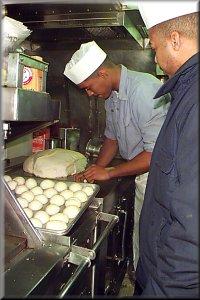 It's a skill making molehills of sweet rolls from a mountain of dough